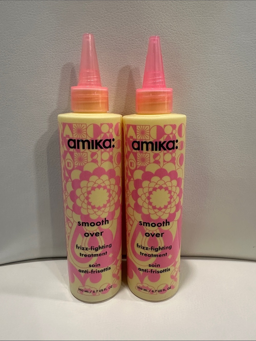 2 amika Smooth Over Frizz-Fighting Treatment